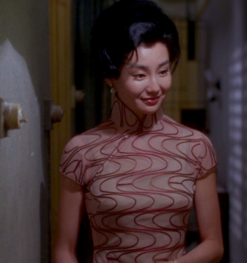 hoanbee:  Maggie Cheung wears a different cheongsam (qipao) dress in each scene of Wong Kar-Wai’s In the Mood For Love. There were 46 in all, though not all made it to the final cut. 