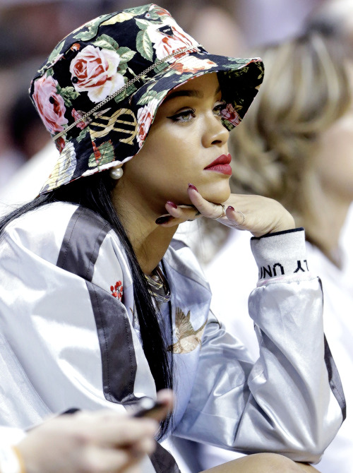 sheisunapologetic: Singer Rihanna watches the second half of Game 2 of an Eastern Conference semifinal NBA basketball game between the Miami Heat and the Brooklyn Nets, Thursday, May 8, 2014 in Miami. 