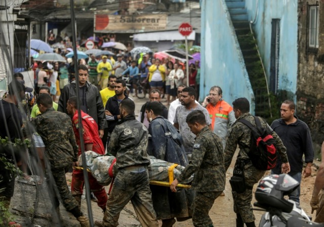 Rescue workers removed the body of a victim from an area destroyed by a landslide in Jardim Monte Verde in Recife, Pernambuco State, Brazil, on May 28, 2022.