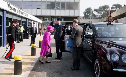 Queen Elizabeth II arrives at Plymouth Railway Station as she visits the city on March 20, 2015 in P