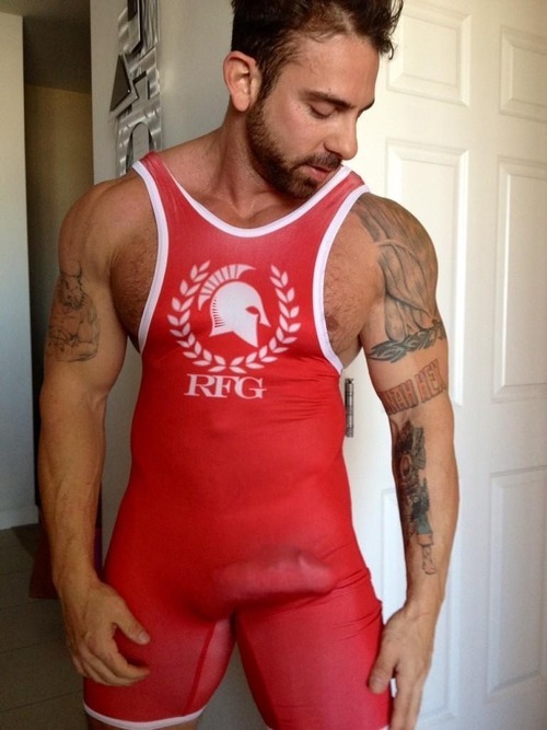 piledriveu:  some singlets pics for ur jacking material…..tight lycra, showing