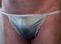 nylonpantyman:  That’s Me, the NylonPantyman, buldging thru my girlfriend’s tight aqua blue with white lace trim string bikini Nylon Panties. I love the feeling of ‘Softness against Hardness’… .   Jim 