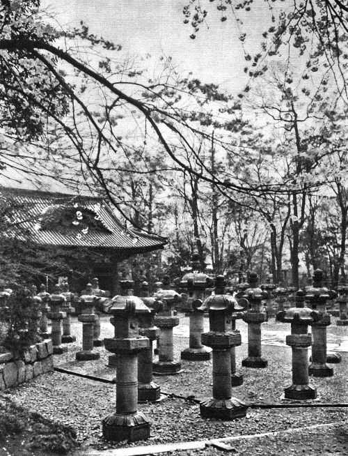 Tokyo, Japan - Stone lanterns in front of the Zōjō-ji temple which is a Buddhist temple in the neigh