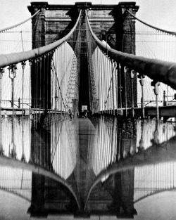 m3zzaluna:  brooklyn bridge in rainy weather, 1927 [historical publications: “reflets photographiques.” Vu 1, no. 2 (march 1928): 49 (as untitled photograph); roh, franz and jan tschichold. foto-auge: 76 fotos der zeit, pl. 36 (as brooklynbrücke