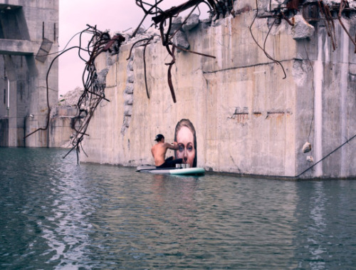 SEAN YORO PAINTS HYPERREAL SEA LEVEL PORTRAITS ON HIS SURFBOARDUsing a surfboard, young Hawaiian art