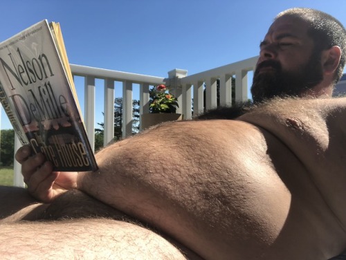 chubbycub78: A little morning sunning in the deck reading a good book. Nice way to relax