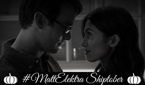 [image caption: black and white image of  Matt and Elektra standing closely together, foreheads near