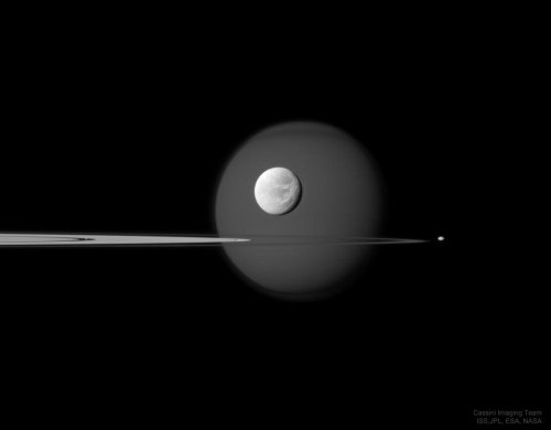 apod:  2021 April 4  In, Through, and Beyond Saturn’s Rings Image Credit: Cassini Imaging Team, ISS, JPL, ESA, NASA  Explanation: Four moons are visible on the featured image – can you find them all? First – and farthest in the background – is