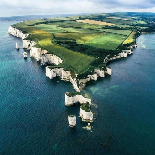 dailyoverview:Check out this incredible shot of the Old Harry Rocks in Dorset, England from @awesome