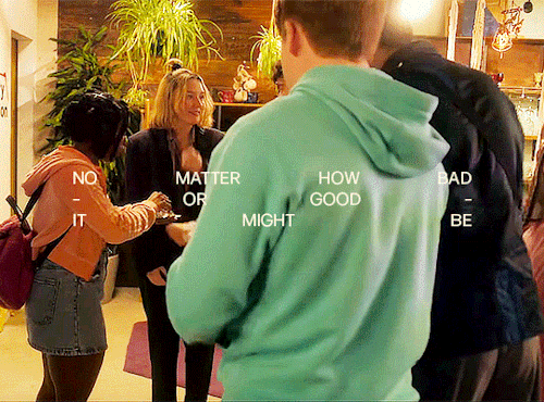 The group is pooling their money for Darcey to buy the suit she wants to wear to prom. Darcy is smiling, she seems moved by this gesture. The text in the gif says: "no matter how bad—or good—it might be"