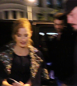 Jessica Chastain with fans outside the Chanel and Charles Finch Pre-Oscar dinner