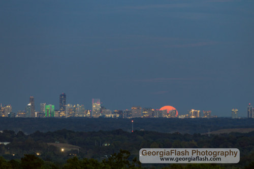 Harvest Moon Over BuckheadPhoto by John Pryor.This picture was taken in Blackhawk Hills, United Stat