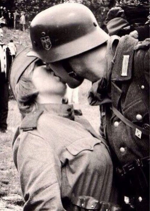 peashooter85:German soldier kissing Russian female soldier (back when Germany and the Soviet Union w
