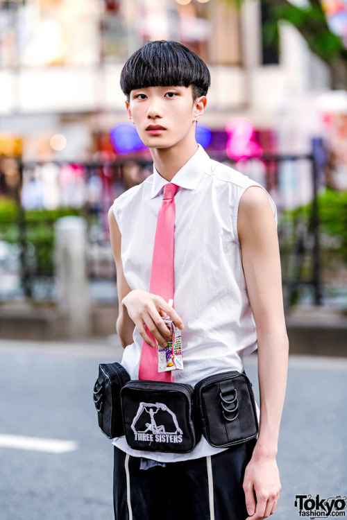 17-year-old Japanese high school student Ryoki on the street in Harajuku wearing a sleeveless top by