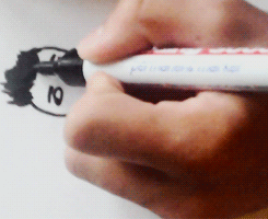 juicybbieber:  Justin Bieber drawing a self portrait  