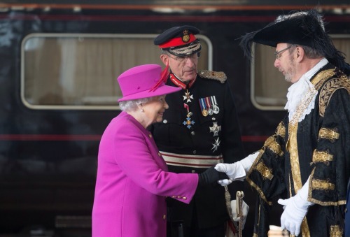 Queen Elizabeth II arrives at Plymouth Railway Station as she visits the city on March 20, 2015 in P