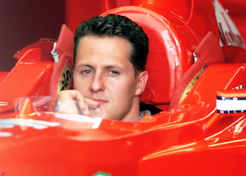 CANADA, 2000 — Michael Schumacher doing his seat fit before the first practice. (Photo by Kay Nietfe