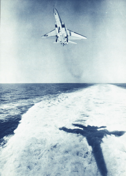 scanzen - An RA-5C Vigilante cats a shadow on the wake of USS...