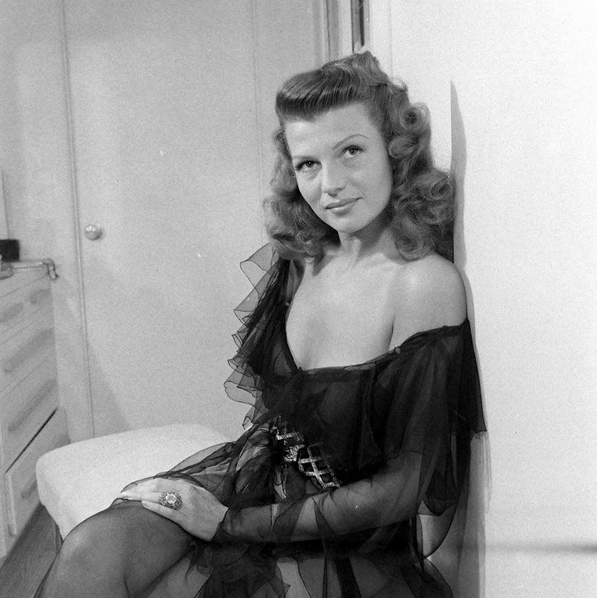 Rita Hayworth photographed by Peter Stackpole for LIFE magazine at home in Beverly Hills, 1945.
