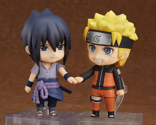 doujinshi:  im so glad the new narusasu nendos are of naruto and sasuke holding hands and pretty much affirming that narusasu is canon 