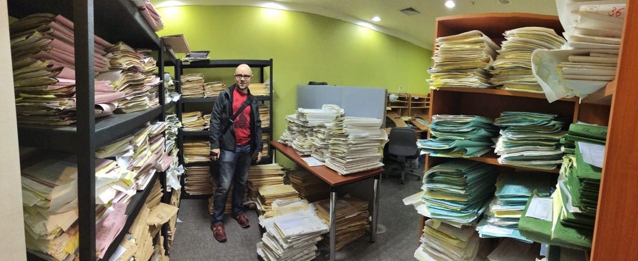 bryankonietzko: Mike DiMartino amidst a stockpile of animation drawings at Studio