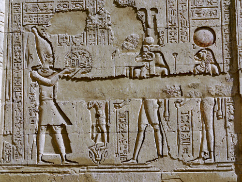 dwellerinthelibrary:The Temple at Esna by MutnedjmetPharaoh offers to Khnum, Menhit, and a little go