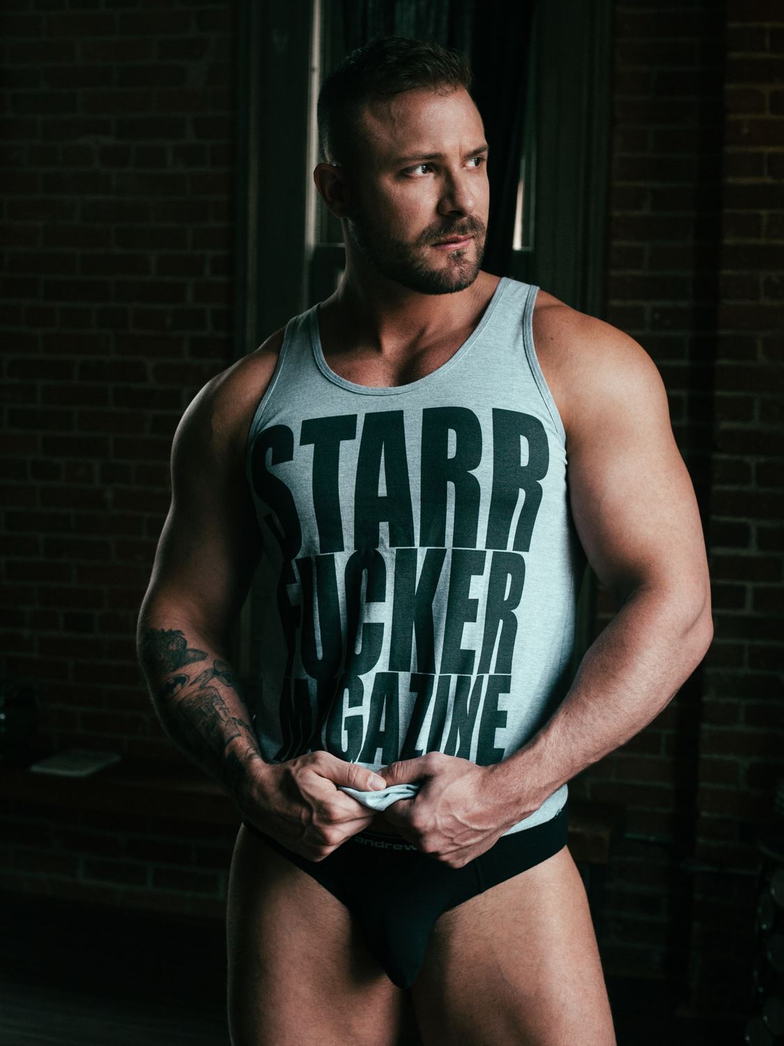 homosexualdelights:  Austin Wolf wearing the Starrfucker Magazine Tank | Photography