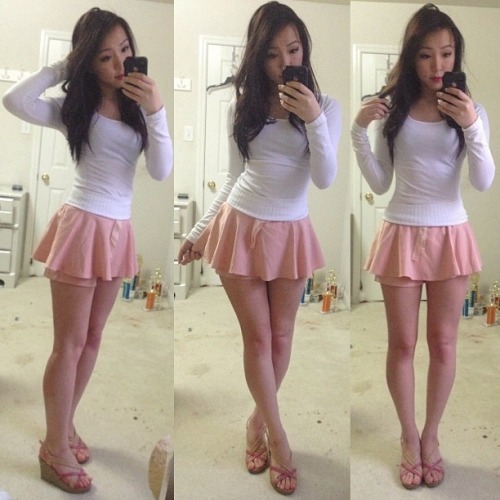 Cute Asian girl in a short skirt