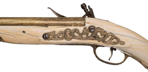 Victorian Era copy of an ivory stock 17th century Dutch Maastricht flintlock pistol.from Rock Island