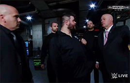 mithen-gifs-wrestling:  Kevin Owens is escorted from Raw–much to his annoyance.