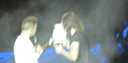 northern-boys-love-gravy:Liam showing Harry some fan art of him - East Rutherford 5/08