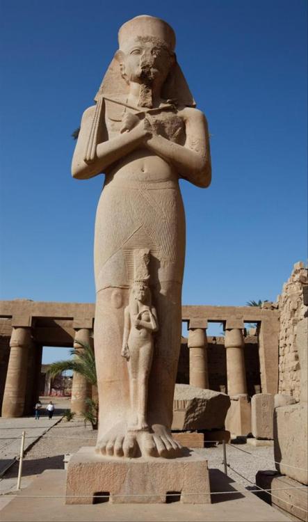 Colossal statue of Ramesses II and his daughter Meritamen, usurped by Pinedjem I (High Priest of Amu