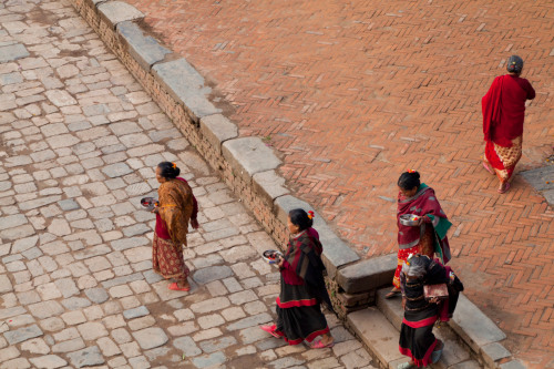 Keepers of tradition, women leave home in the early morning honoring the Gods in the temple and shri