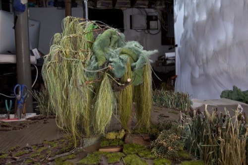 from89:  Magical Miniature Worlds (by Matthew Albanese) Dioramas made using painted parchment paper, thread, hand dyed ostrich feathers, carved chocolate, wire, raffia, masking tape, coffee, synthetic potting moss and cotton. 