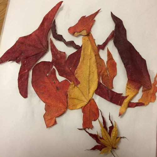weallheartonedirection:Charizard made from autumn leaves