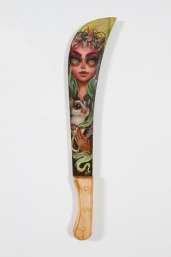 spokeart:  Brooklyn-based artist Tatiana Suarez has recently created this exciting new piece, an original oil painting done on an actual machete! This painting will debut at the ArtPadSF fine art fair, happening May 16th-19th here in San Francisco. 