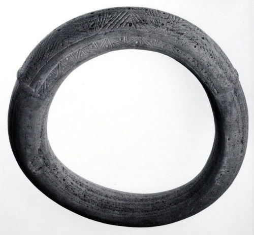 Taíno stone yoke (Dominican Republic, 13th – 15thcentury), 38cm in length.Stone elliptical collars s