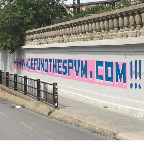 “www.DefundTheSPVM.com!!!” Anti-cop graffiti in Montreal, Quebec