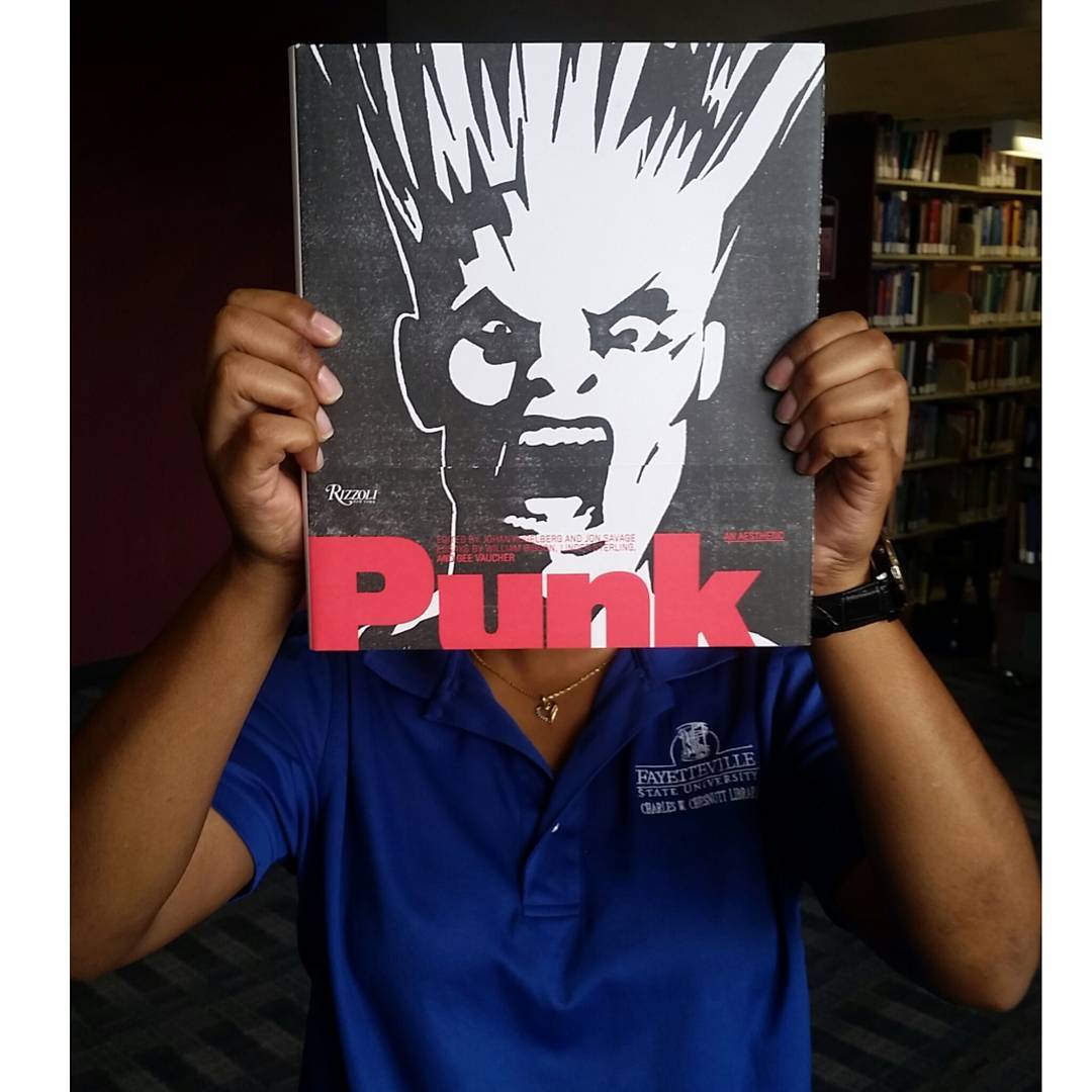 Today is the last day of #summerschool. We are closing out with a #bookfacefriday featuring “Punk: An Aesthetic” (2012) via @rizzolibooks. Check out this book and many other books available in our #newbooks collection! #newbooksshelf #sleeveface...