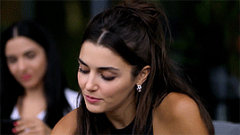 Laughter Bubbles Up At The Back Of Her Throat , Mouth Quirking In A Half - Smile , And She Briefly Lets