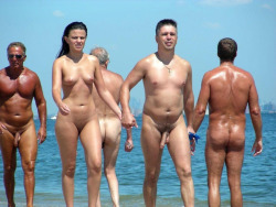 serdgio-beach:  larrysbareagain: cnbseen:  Hand in hand.  Enjoying a gorgeous day on the beach with other nudists   👍👍👍