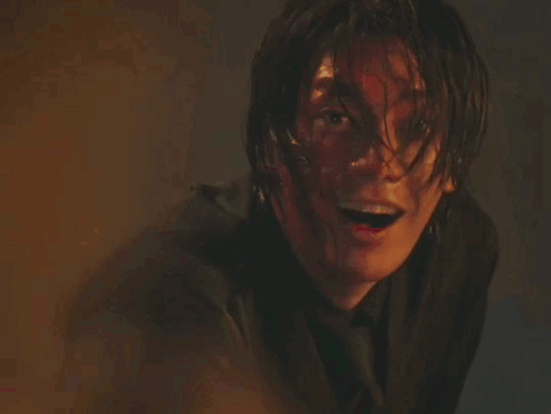 doyoung laughing, covered in blood