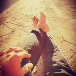 Barefoot at rising sun.  New morning, new