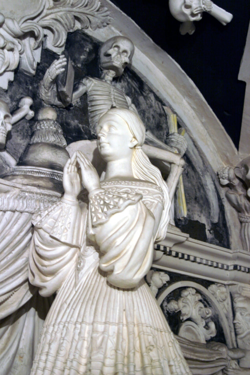 Praying statue of a man and woman from the Crypt of the sanctuary of Santa Maria de la Victoria