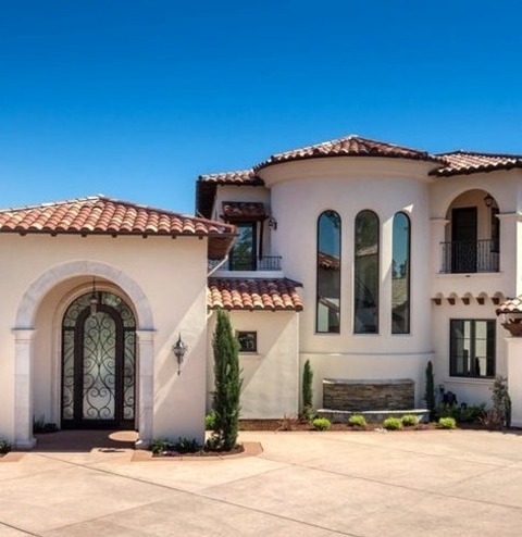 Stucco ExteriorLarge Mediterranean White Two-story Stucco Exterior Home Idea