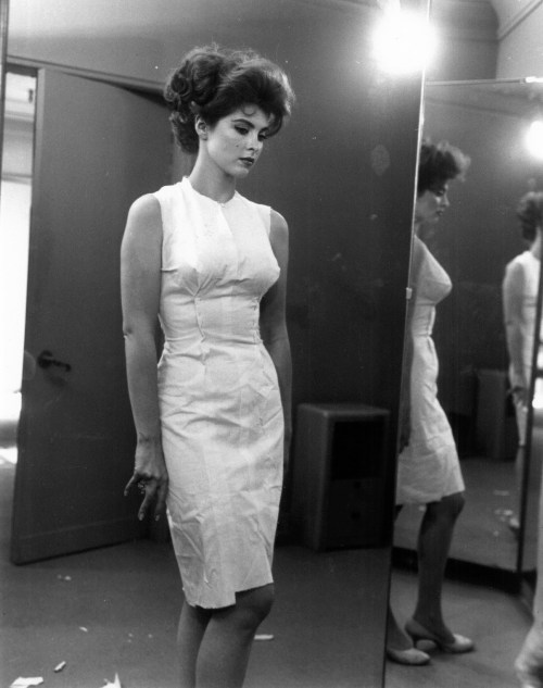 grapnel:  Tina Louise looking a little pensive in a white dress.  