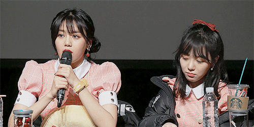 bored child mina making hyejeong’s hair her toy.