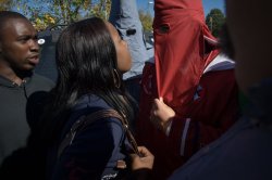 ask4permission1st:  crimesandcuriosities:  An African-American woman confronting a member of the Ku Klux Klan at a public demonstration in Mississippi. (Photograph by Anthony S. Karen)   Man I love Black Women so much.