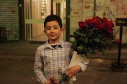 azalsager: Faris, a Syrian roses seller boy who was killed by an air strike. So people decided to draw a picture of him upon a building wall in Germany to keep his memory alive. 