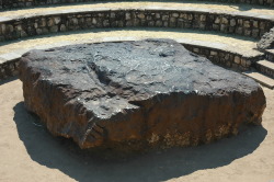 sixpenceee:    Hoba Meteorite    The Hoba meteorite is thought to have fallen more recently than 80,000 years ago.   The meteorite is unusual in that it is flat on both major surfaces, possibly causing it to have skipped across the top of the atmosphere